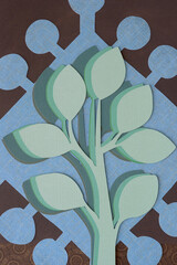 Wall Mural - abstract paper background featuring conceptual tree machine-cut from various shades of green paper and arrange don die-cut paper shape with coronet edge