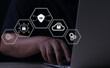 © sarach - Cyber security and data protection. Businessman using digital tablet protecting business and financial data with virtual network connection, smart solution from cyber attack, innovation technology