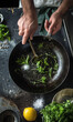 © sam richter - Chef sautéing fresh greens with zesty lemon