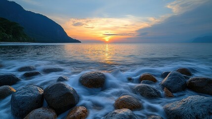 Canvas Print - Sunset ocean waves rocky beach sunrise mountain