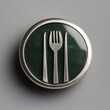 © lestari - Silver flatware icon on green surface, centered on gray for restaurant promotion
