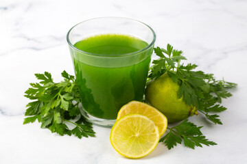 Wall Mural - Green healthy detox, lemon and parsley juice. Green vegetable smoothie