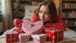 © useful pictures - Thoughtful Woman Surrounded by Beautifully Wrapped Gifts in a Cozy Indoor Setting During Daytime
