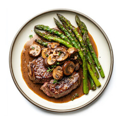 Wall Mural - Delicious Plate of Steak with Asparagus and Mushroom Sauce Isolated on a White Background 