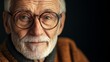 © Joachim - A close-up portrait of a mature man with glasses, capturing his gentle expression and wisdom, surrounded by a warm and inviting atmosphere.