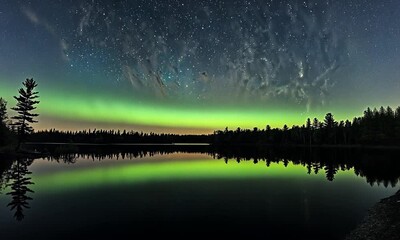 Wall Mural - A magnificent holographic aurora borealis display lighting up the sky over a peaceful lake.