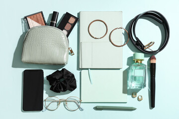 Wall Mural - composition with stylish female accessories, notebooks and mobile phone on color background