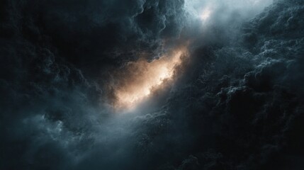 dramatic sky with a bright light shining through dark clouds in a swirling pattern