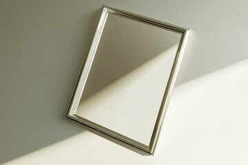 Wall Mural - Minimalist 3D platinum frame mock-up, dynamically tilted for stylish ads.