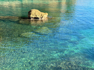 Wall Mural - Mediterranean sea with crystal clear turquoise blue water.