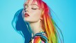 © Biggy - Vibrant Model with Colorful Hair Posing Against Blue Background