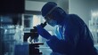 © AndiAzis - Scientist Carefully Examines Sample Through Microscope in Lab, Conducting Research Thoroughly