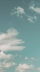 Wall Mural - Gently Fluffy Clouds Cloud Sky Blue Moving In Blue Cloudy Sky With Fluffy Clouds. Natural Background Cloudscape Time Lapse, Timelapse, Time-lapse. Blue Background. Abstract Blue. Cloud White Blue Sky