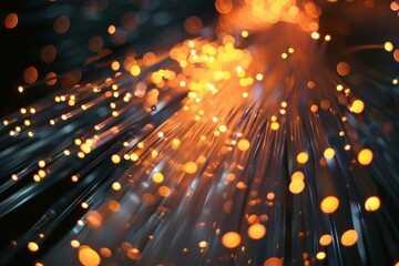 Wall Mural - fiber optic cables transmitting orange light data creating a beautiful bokeh effect