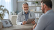 © Ariba - A middle-aged doctor discusses test results with a male patient using a tablet during a hospital consultation. The doctor, seated at a desk, reviews the analysis in the office.