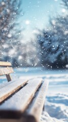 Poster - Serene winter day with snow gently falling on a wooden bench in a tranquil setting