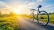 © Sawat - A road bike placed on an open highway stretching toward the horizon under a clear sky.