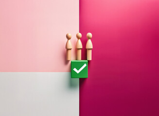 Aufkleber - Grainy texture image of three wooden figures standing above a green square with a checkmark, set against a pink and white background.