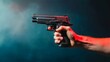 © PongSS - Determined Grip on Black Handgun , Close-up shot of a hand firmly gripping a black handgun against a dark background.
