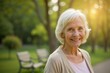 © Mikhail - Elderly woman smiles in serene park during golden hour