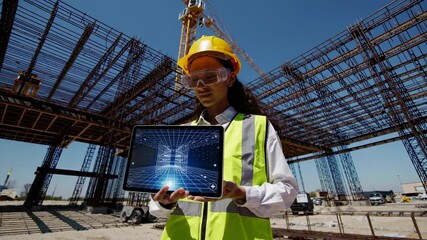 Aufkleber - Engineer uses digital technology on construction site in sunny weather