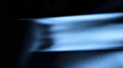 Fototapete - Futuristic glowing blue geometric banner element set against a grainy noise textured black and blue background creating a dynamic modern