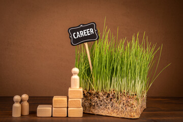 Wall Mural - career concept. miniature human figures on a wooden table