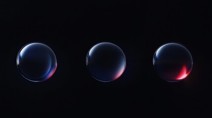 Wall Mural - three different colored spheres are shown in a black background