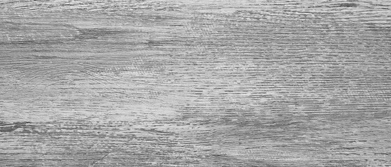 Poster - A wooden surface with a grainy texture. The wood is grey and has a rough appearance. The surface is not smooth and has a lot of texture