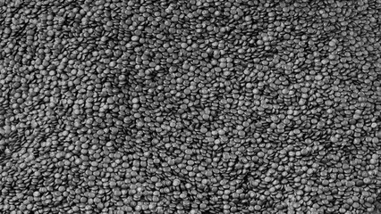 Aufkleber - Black texture background of a pile of black beans. beans are scattered all over the surface, with some of them overlapping each other. image has a somewhat chaotic and disorganized feel to it