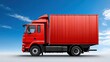 © KN Studio - Red Delivery Truck Against Blue Sky: A vibrant red delivery truck, symbolic of transportation and logistics, stands against a backdrop of a bright blue sky with fluffy clouds.