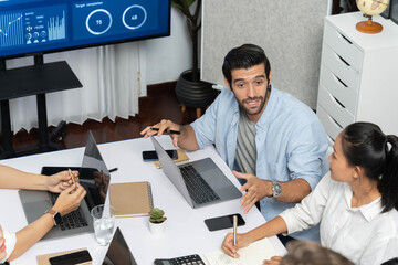 Fototapete - Analyst team utilizing BI Fintech to analyze financial data at table in meeting room. Businesspeople analyzing BI dashboard power for business insight and strategic marketing planning. Prudent
