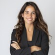 © SECOND - Confident businesswoman portrait, studio, arms crossed, white background, website headshot