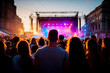 © ArtFocus Studio - Immersive Concert Experience: A Captivating Crowd at Sunset, Enjoying the Thrilling Live Music Performance Under the City Lights