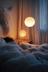 Wall Mural - A person relaxing in bed with a lamp providing soft lighting