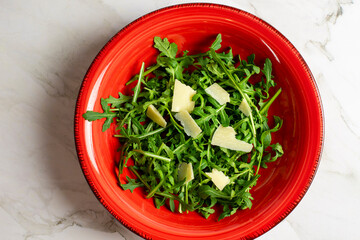  Arugula and parmesan salad in a bowl