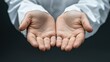 © ahmad - Open hands presented for giving or receiving, symbolizing generosity and openness.