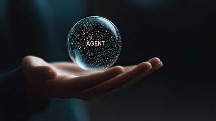 Fototapete - hand holding glowing sphere with word AGENT surrounded by stars, symbolizing technology and innovation
