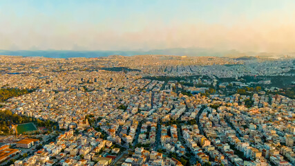 Wall Mural - Athens, Greece. Watercolor illustration. Panorama of the capital during sunset. Roofs of houses, Aerial View