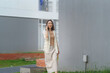 © amnaj - Young Professional Woman Talking on Phone Outdoors