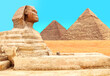 © frenta - Famous Great Sphinx and pyramids of Chephren, Cheops, Menkaure, Cairo, Egypt. Great Pyramids and statue of Sphinx, mythical creature with head of man and body of lion, Giza complex (Giza Necropolis)