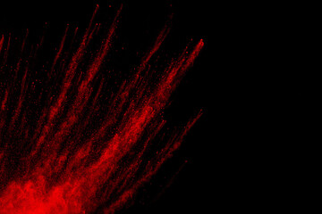 Wall Mural - freeze motion of red color dust particles splashing.