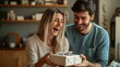 © Discover stocks - Young couple in casual attire celebrating a special occasion at home the woman opening a gift with excitement while the man looks on with a smile in a relaxed household setting