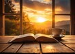 © piyawat - Tranquil scene with an open book and coffee on a wooden table by a sunsetlit window overlooking a picturesque landscape.