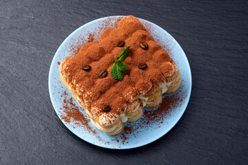 Wall Mural - Classic Tiramisu Dessert on Rustic Plate