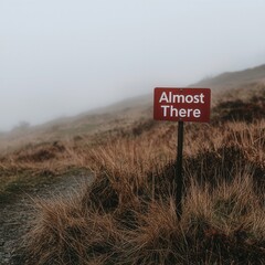 Journey to almost there scenic trail sign in misty landscape nature serene environment