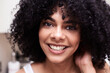 © Westend61 - Portrait of smiling beautiful young woman
