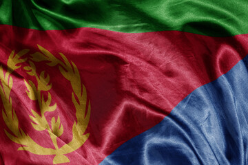 Wall Mural - shine waving colourful realistic national flag of eritrea . macro shot