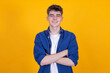 © carballo - portrait of young smiling teenager isolated on yellow background