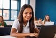 © Max Yamuna - smiling female student using a laptop in a classroom with a group of students